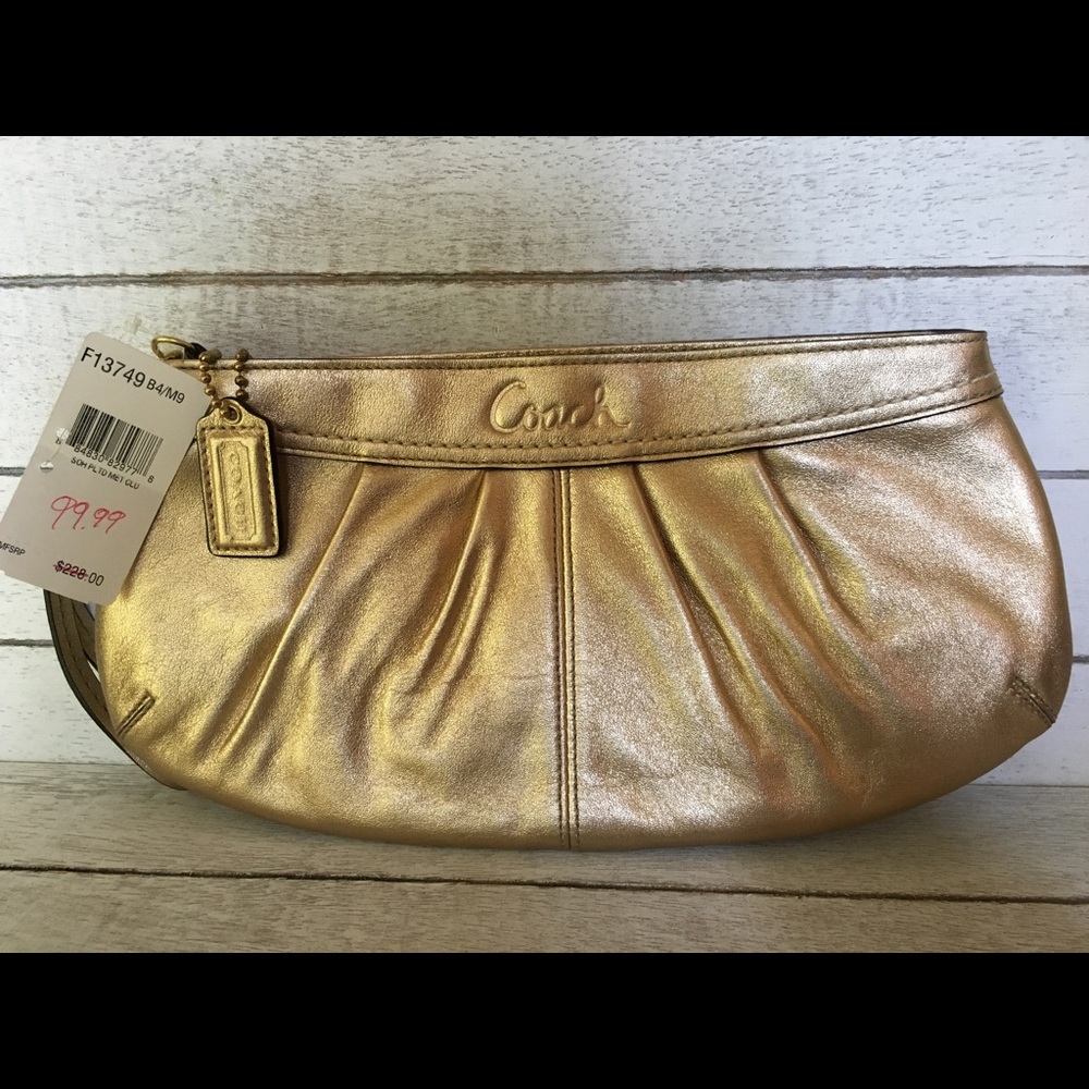 Coach gold clutch (NWT)